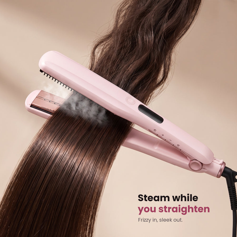 ANGA steam straightener gliding through hair with steam