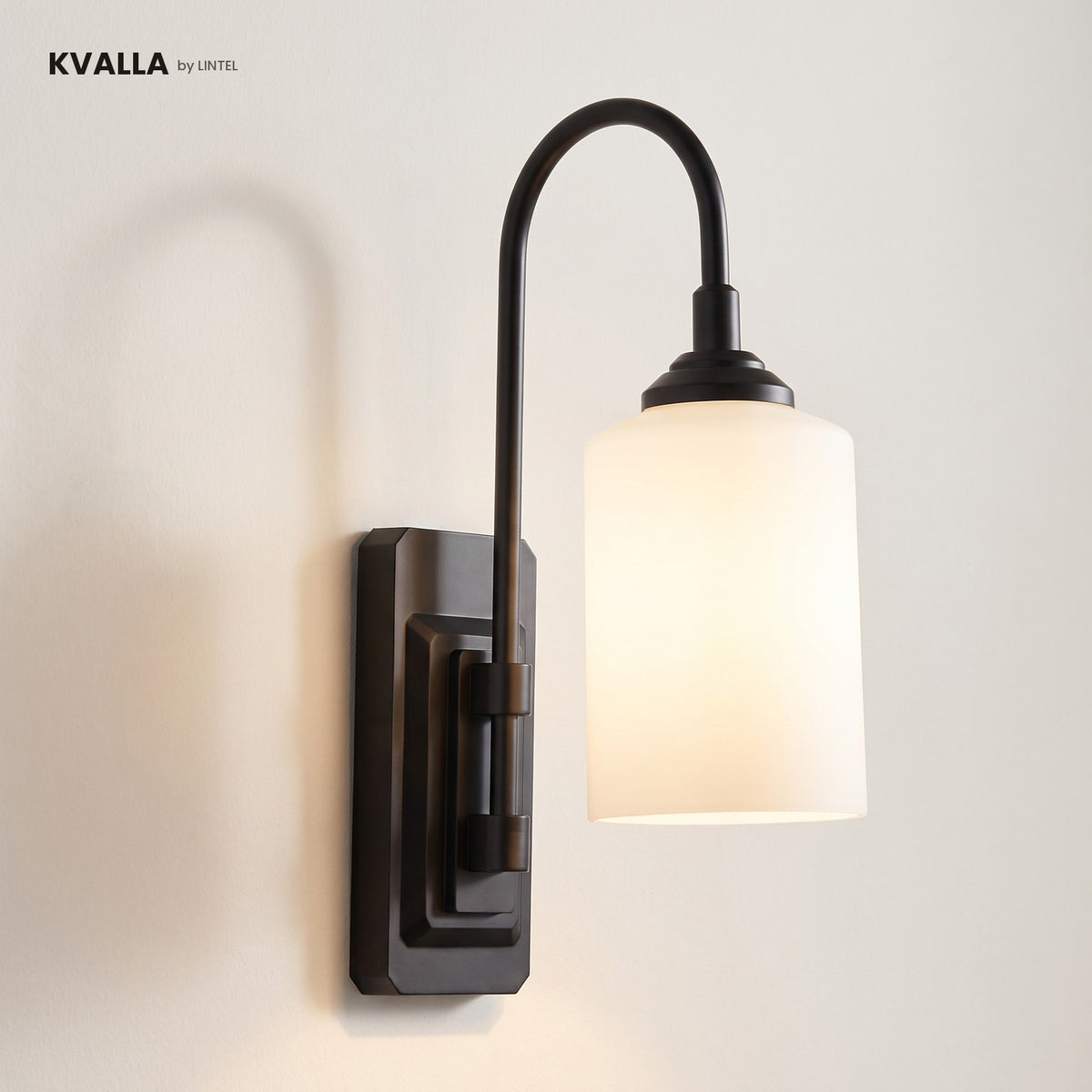 KVALLA wireless wall sconce in matte black