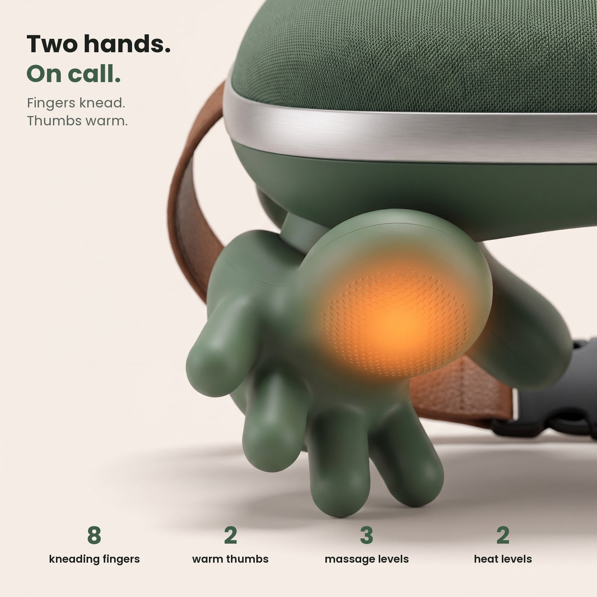 KNADA close-up: silicone kneading fingers and a warm thumb pad; 8 fingers, 2 warm thumbs, 3 massage levels, 2 heat levels