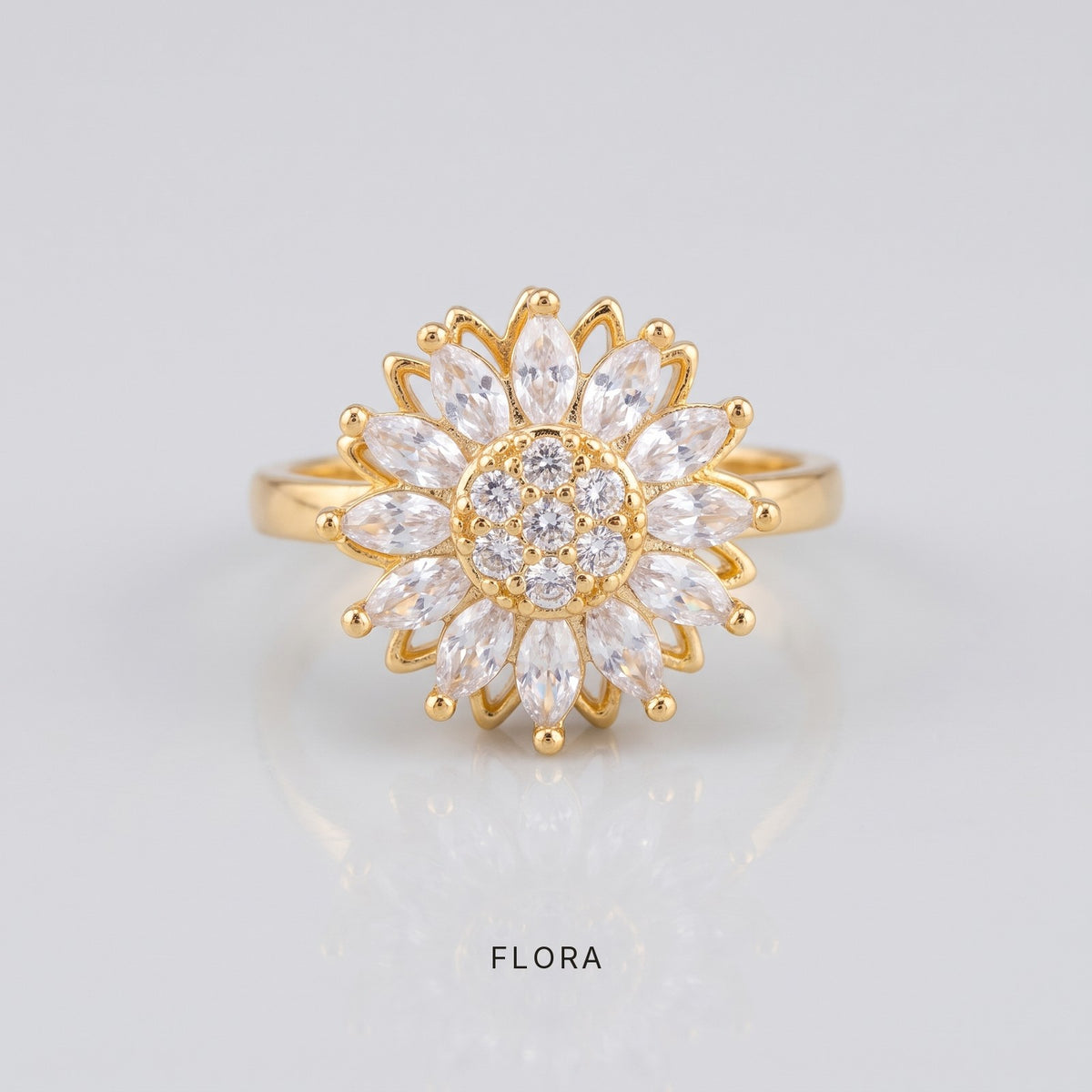 LUGNA Calm Ring Flora in gold, spinning crystal sunflower