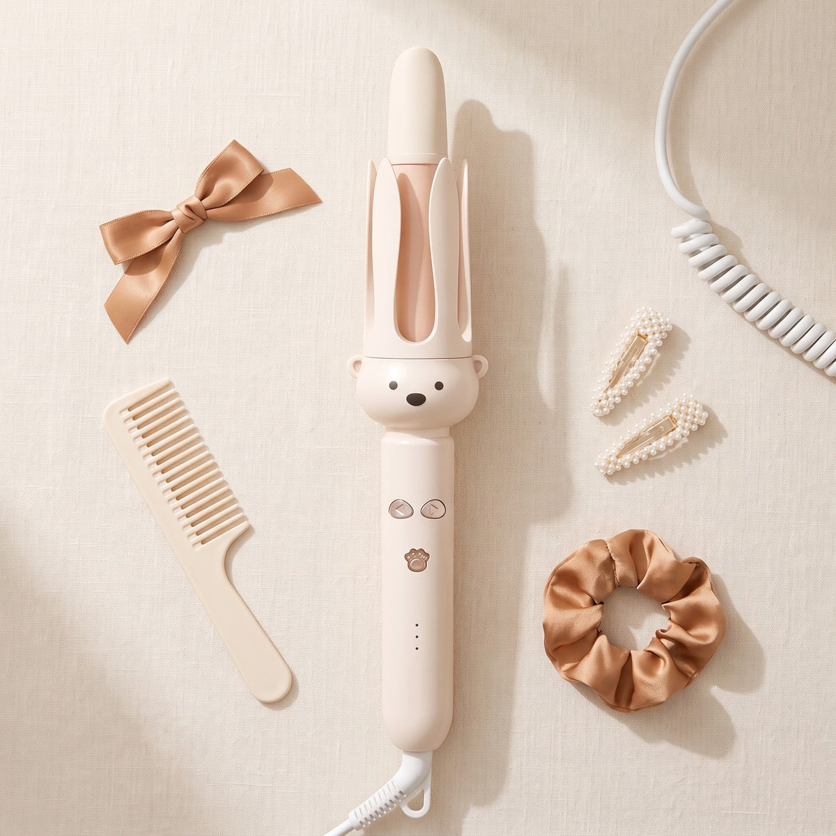 LOCKA curler with a hair bow, comb and clips